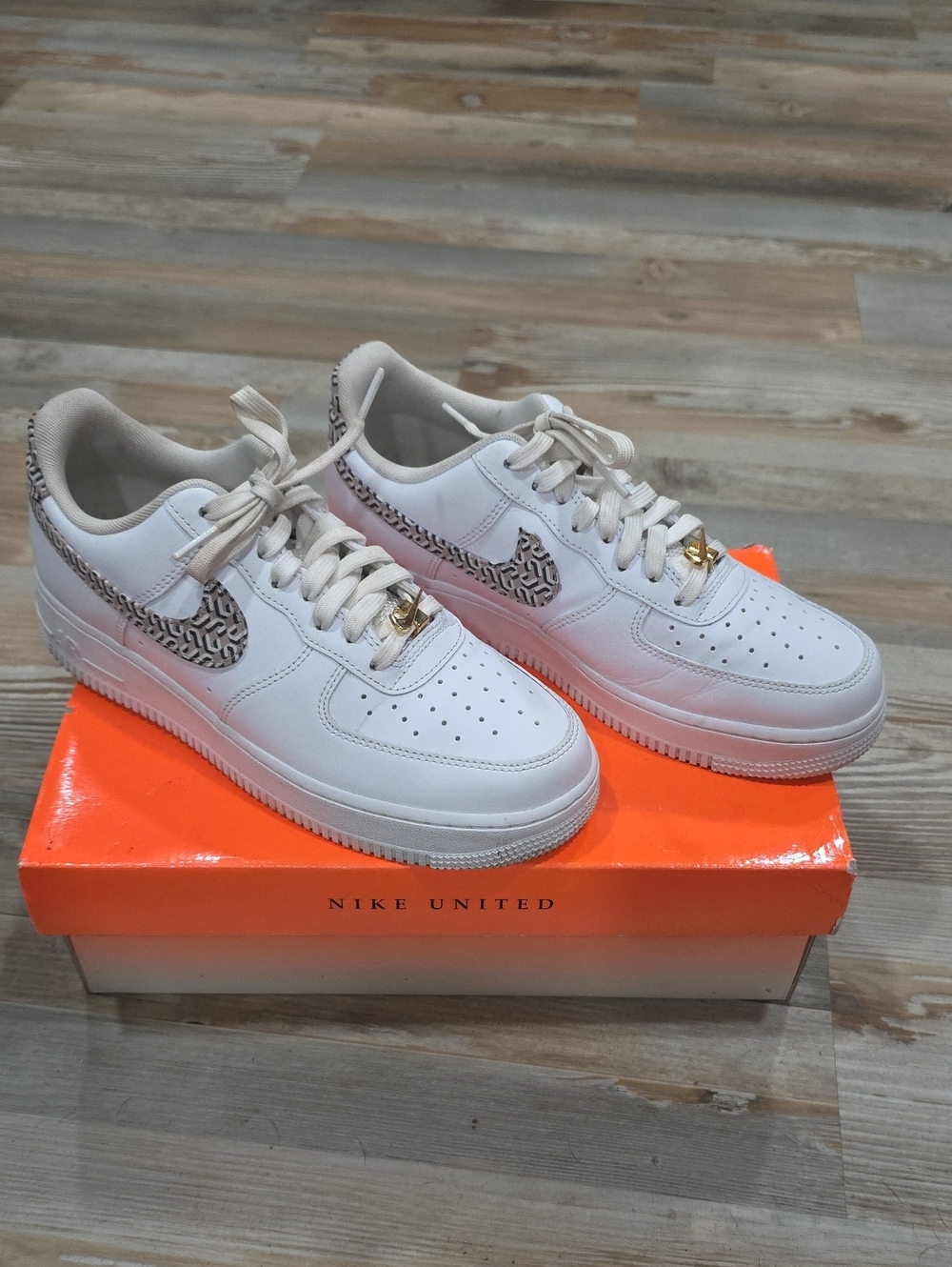 Nike White Air Force 1 Low with Leopard Swoosh